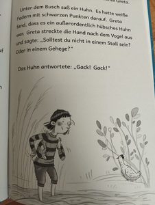 Buch mit Schrift und einem Bild von einem Mädchen und einem Huhn